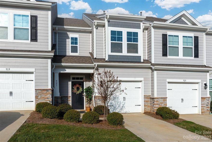 Well maintained 3 bedroom, 2.5 bath unit has been freshly painted and gently lived in (home was considered second home). Stainless steel appliances, kitchen island with granite counter tops and open floor plan is main level living. If you love the Lake Life, this is it with Charlotte and all it has to offer including the airport are all 20-30 minutes away, yet excellent location to nearby restaurants, shopping and Lake Wylie access. Primary bedroom is on upper lever with walk-in closet, large primary bath with tiled shower, dual sink vanity, linen closet and separate water closet. Laundry room with washer/dryer, 2 bedrooms and full bath on upper level. Security system in place with keypad door lock, garage door opener. Community amenities include lawn maintainance, Clubhouse, outdoor pool, picnic/grilling area, playground, workout room, bocce and pickle ball courts. Home Warranty included.