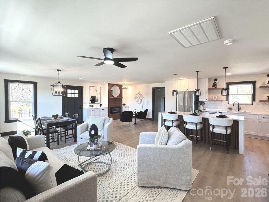 Newly renovated from top to bottom, this beautifully updated home offers modern design and quality craftsmanship throughout. Originally built in 1959 and completely remodeled with permits, nearly every component has been replaced, creating the feel of a new home on an established 0.85-acre lot.

The open-concept layout features all new flooring, fresh drywall, updated lighting, and a redesigned kitchen with new cabinetry, quartz countertops, stainless steel appliances, and a spacious island ideal for gathering and entertaining. Three fully updated bathrooms showcase contemporary finishes and clean, modern design.

Major upgrades include a new roof (2025), new HVAC system, new plumbing, and new electrical throughout, providing long-term peace of mind. With 1,475 square feet of thoughtfully designed living space, this home offers both functionality and style.

Enjoy outdoor living with a covered front porch, side deck, and ample driveway space, all situated on a generous lot offering privacy and room to spread out.

Move-in ready and conveniently located in Monroe, this is a rare opportunity to own a fully renovated home with modern systems and finishes already in place.

Schedule your showing today.