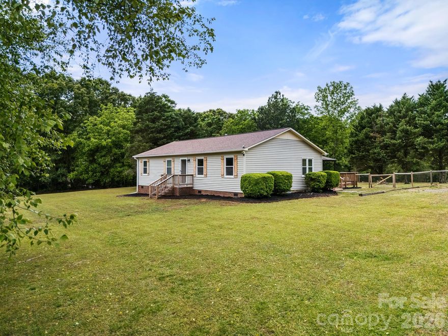 Tucked away on 6 private acres, this property offers a rare chance to live surrounded by space, quiet, and possibility—without giving up the convenience of town. Located just about 15 minutes from South Rock Hill, shopping, and dining, you can enjoy the best of both worlds: peaceful retreat and everyday accessibility.

The 3-bedroom, 2-bath home provides a comfortable, welcoming layout filled with natural light and views of the surrounding land. It’s the kind of setting where mornings are quiet, evenings are wide open, and there’s room to truly breathe.

Beyond the home, the property continues to impress with a barn and a separate, fully wired structure currently used as a studio—ideal for a creative workspace, home business, workshop, or private retreat. The flexibility here allows you to shape the property around your lifestyle.

Whether you envision a mini-farm, a place to pursue hobbies, or simply a private escape from the pace of everyday life, this property delivers a unique opportunity to create something truly your own.

Space, privacy, and proximity—this is the lifestyle so many are searching for, yet so few properties offer.