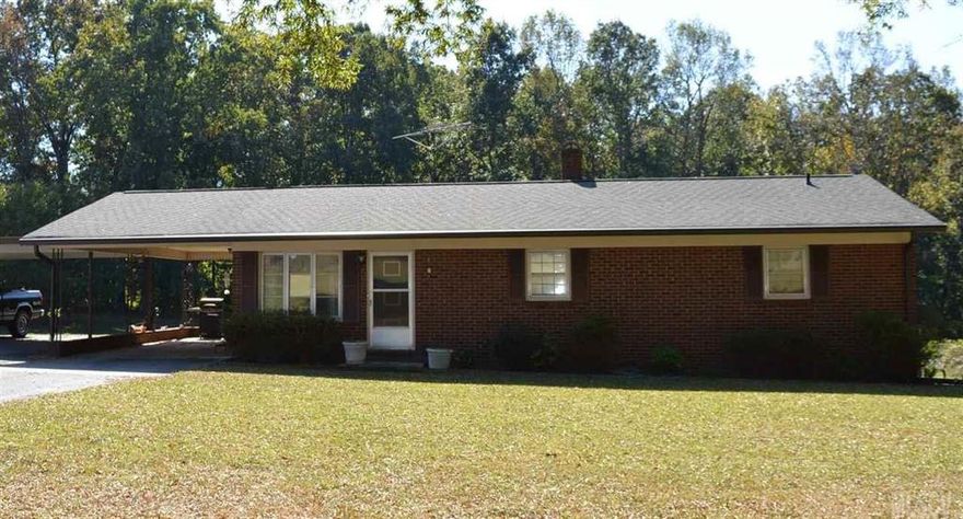 Wonderful 3 bedroom 3 bath brick ranch with basement. Large kitchen, dining area and family room great for family gatherings. Living room, two bedrooms, two baths and laundry room also on main level.  Third bedroom and bath in basement along with large unfinished area and single garage. Unfinished room in basement with fireplace and vented for heat and air could make another great gathering place for family and friends. Large lot has garden area, storage building, grape vines, berry & fig bushes.  This home has much to offer!