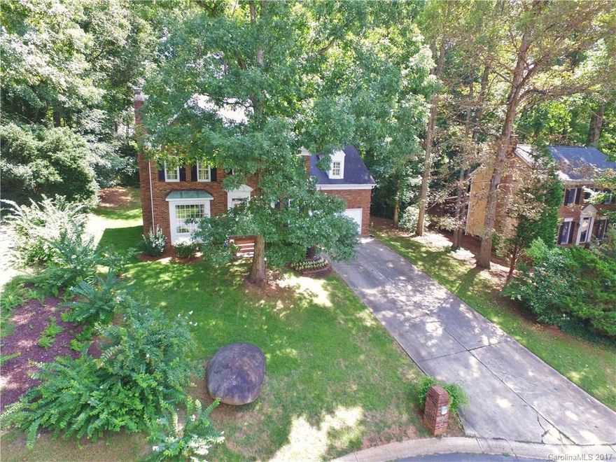 Beautifully Update Full Brick 3BD/2.5 BA Home w/BONUS RM in Wynfield on a Large Wooded Cul De Sac Lot! New Hardwoods Floors through main level and New Carpet Upstairs! $30K KITCHEN RENOVATION w/New Cabinets, Granite, SS Appliances, Tiled Backsplash & Custom Coffee Bar! Laundry Room moved upstairs! Both Baths on 2nd Fl Newly Titled. Most Lighting Fixtures Recently Updated! Private hard to find Wooded Cul De Sac Lot! Great Back Yard for Entertaining! 13 Month Home Warranty Included! New Roof 2009!