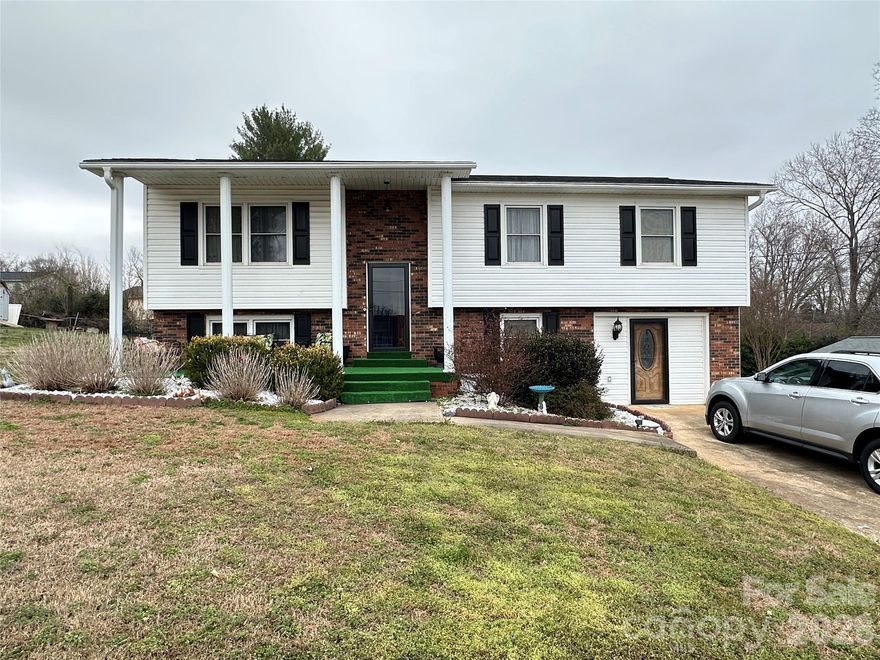 408 Cardinal Dr in Newton is a 3 bedroom, 2 bath single-family home built in 1978, with 1,244 square feet of heated living area on a 0.28 acre lot.  Tucked into an established Newton neighborhood, this one-level home offers the kind of everyday ease that never goes out of style. From the moment you arrive, the setting feels welcoming—mature surroundings, a quiet street, and a yard that invites you to slow down for a minute before you even step inside. 

The floor plan is simple and practical, with everything on one level for comfortable day-to-day living. A central living area sits at the heart of the home, giving you a natural place to gather, relax, and connect at the end of the day. Three bedrooms provide true sleeping spaces or options for a home office, nursery, or hobby room, and two full baths help mornings and guest stays run more smoothly. This home features city water and sewer, so no maintenance concerns for the busy homeowner.  All appliances including the washer/dryer convey, making it move-in ready.  No HOA is noted as well, saving you monthly fees.  The mostly finished basement has a drop ceiling measuring 6' 11".  There is an unfinished/unheated area, as well as an unfinished but heated laundry room - professional measurements are forthcoming.

The 0.28 acre lot offers enough outdoor space to enjoy without taking over your weekends. There is room for a grill, fire pit, play set, or garden and room for pets. The yard feels like an extension of the living area, creating opportunities for outdoor living in every season—morning coffee outside, casual cookouts, or quiet evenings in the open air.  The exterior storage shed conveys with the property.

The surrounding Cardinal Drive area is made up of similar single-family homes of comparable age and scale, giving the street a cohesive, comfortable neighborhood feel. It is the kind of place where evening walks feel natural and familiar faces become part of your routine. Located within Newton in Catawba County, the home offers convenient access to local services, shopping, and commuter routes while maintaining a quieter residential setting.