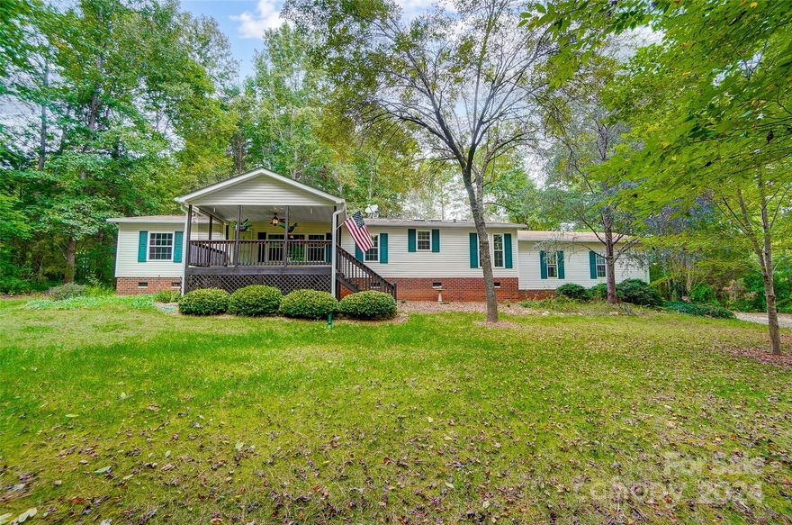 Welcome home to this charming 3-bedroom, 2-bathroom property, nestled on a peaceful 1.11-acre lot on a dead-end road. Step inside to find an oversized living room, perfect for relaxing or entertaining guests. The home also features a versatile flex space, ideal for a home office. Updates include a new HVAC system installed (2020) with a transferable warranty, roof replaced and skylights installed (2011), and new gutters and windows in 2010. The exterior boasts newer insulation and siding, complementing the serene, country-like setting with beautiful trees scattered throughout the property. The flex space, bathroom, and hallway were freshly painted in 2024, and the carpets have been professionally cleaned. A 600 sq. ft. attached garage offers ample storage or workspace, and there's an additional building in the back for extra flexibility. A termite inspection was completed in June 2024, giving you peace of mind. Don't miss out on this well-maintained home!