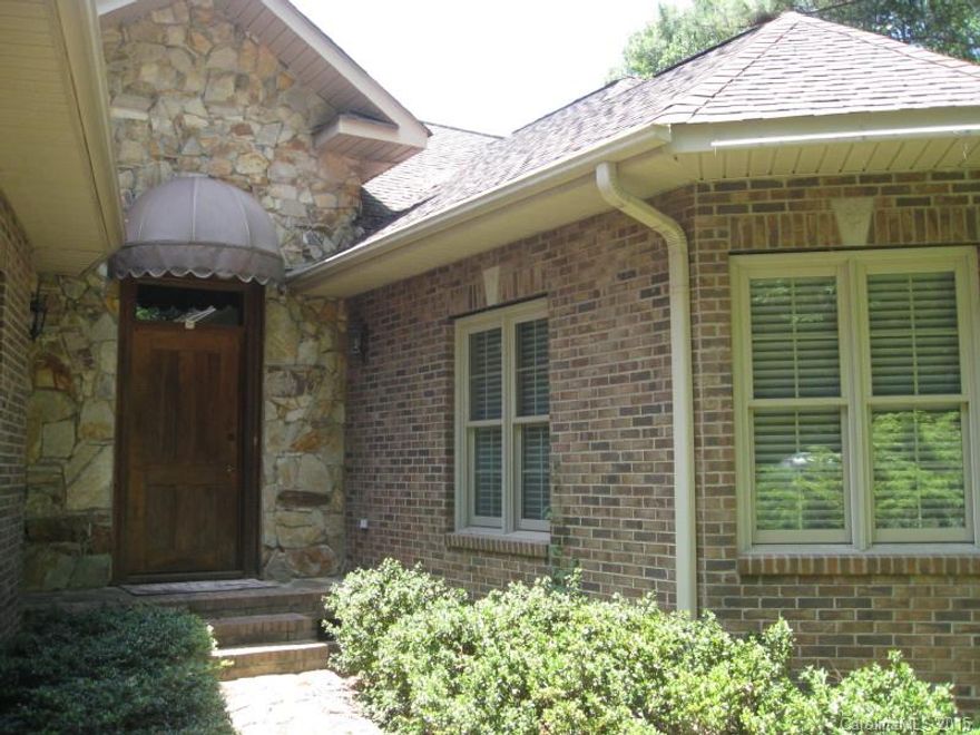 Beautiful ranch style all brick home on wooded one acre lot on cul-de-sac. Home features custom made solid cherry kitchen cabinets and solid wood doors throughout. Two skylights in wide hallways. Den w/built in shelves. Master bedroom has 2 closets, 1 large walk in. Oversized garage w/large workshop with back garage door entrance.