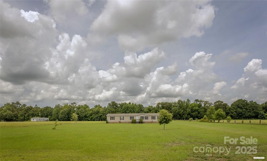 If space is what you need, this home has it—inside and out. With 5 bedrooms and 2 full bathrooms, there’s room for everyone and then some. Whether you’ve got a big family, need extra space for guests, or just want a home office and a hobby room, this layout gives you the flexibility.

The main living area is wide open and flows into a spacious kitchen with plenty of cabinets and room for a big dining table. The primary suite is tucked away with its own private bathroom, and the other bedrooms are a great size! NO ONE gets stuck with the small room here.

Sitting on nearly three acres, the lot gives you a big front and backyard. Perfect for pets, kids, cookouts, or just some peace and quiet. No HOA, plenty of parking, and you’re just a short drive from town, schools, and Shaw AFB.

This is one of those homes that gives you space, freedom, and potential. All at an affordable price. Come take a look and see if it feels like home.