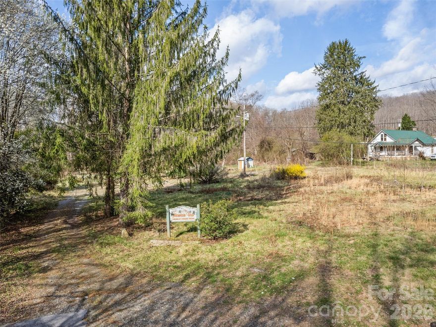 Great Income potential property for RVs or manufactured homes. Private location in Scotts creek and convenient to all the Smoky mountain hiking, fishing and kayaking areas. The land has Utilities already installed...community water, electricity and septic for multiple units.