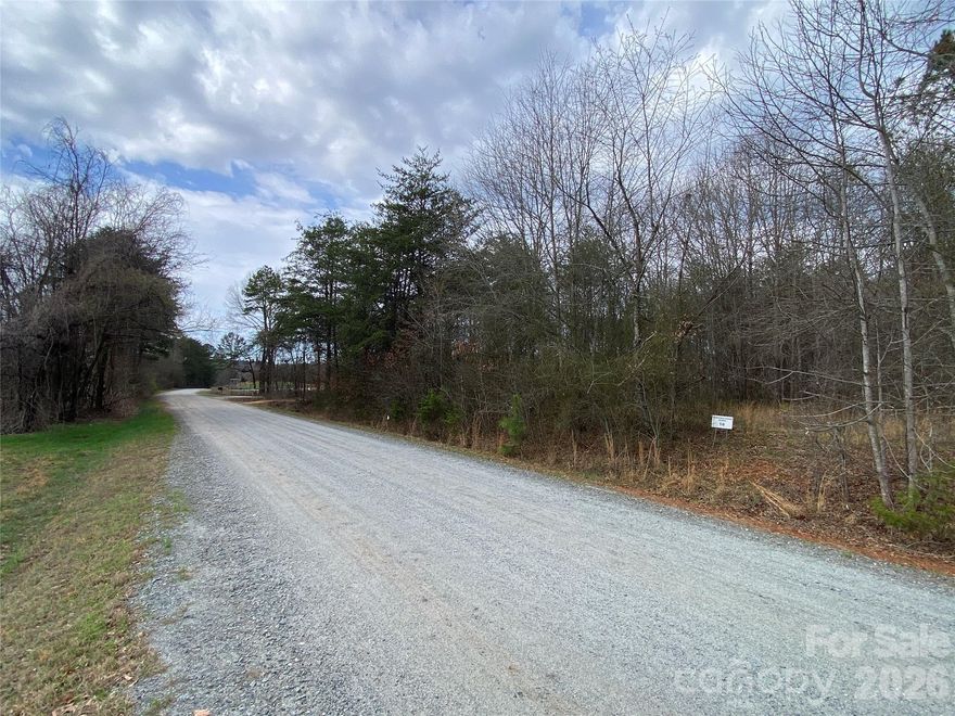 Don’t miss this excellent opportunity to own ±2 acres of wooded land located near the North Carolina / South Carolina state line. This property offers the perfect blend of privacy, flexibility, and convenience in a peaceful rural setting. The tract is beautifully wooded, providing natural seclusion and multiple potential homesites. A guaranteed septic permit is already in place, saving valuable time and expense for future development. Very limited restrictions apply—double-wide manufactured homes are allowed, while single-wide homes are prohibited. Bring your RV or Motorhome and enjoy this country setting. With no HOA and minimal restrictions, this property is well-suited for a primary residence, weekend getaway, or long-term investment. Enjoy the freedom of country living while remaining within easy driving distance to nearby towns, shopping, dining, and major roadways in both North Carolina and South Carolina. A great chance to secure a versatile, build-ready wooded tract in a desirable state-line location.
