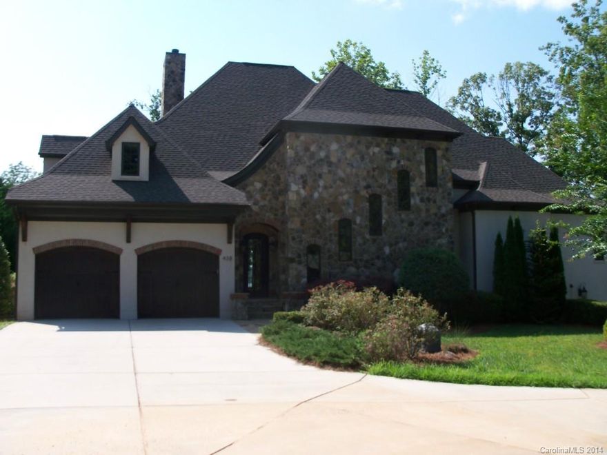 Beautiful lake front home near prestigious Tuskarora Point. Home has been well maintained and was built by Kenneth Bealer Homes.  This home features two beautiful wrought iron doors; one at the entrance and one at the wine cellar.  Laundry on all three floors for your convenience.  Three stone fire places and 1 outside fire pit.  Many built-ins.