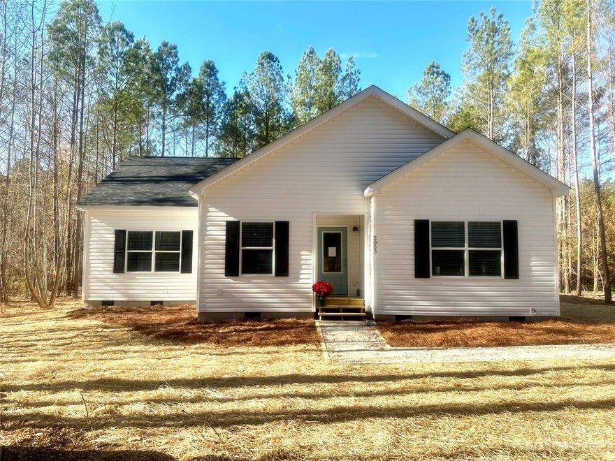 BACK ON MARKET THROUGH NO FAULT OF SELLER!! Wow!!! Under $200 per ft with acreage! This open concept designed home has 9’ ceilings, wide vinyl plank floors, an abundance of cabinetry to the ceiling in the kitchen and granite countertops throughout. The expansive island and grand dining space make family gatherings around the holidays possible. The spacious laundry is perfect for a family of any size. All the bedrooms are carpeted to help keep feet warm when waking up on those cold mornings. The secondary bedrooms are spacious with plenty of room for games, toys, or crafts. The outside boasts a large deck for the grill overlooking the 2.5-acre yard with many ideal locations for a large garage, she-shed or a storage building for all those outdoor toys. You can be in Chester in 15 minutes or at the Rock Hill mall in about 30 minutes.