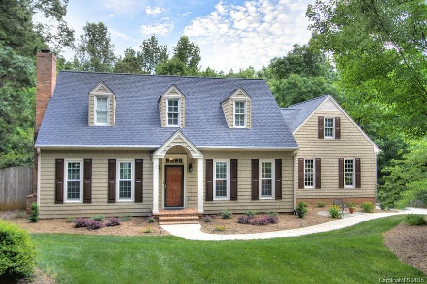 Gorgeous wooded lot w/fenced backyard & pool! Updates galore! Guest BR & full BA on main. Downstairs BA & Master BA totoally renovated! New SS appliances. New granite & tile backsplassh. New water heater 2013. Brand new carpet upstairs. All HDWDs on main. New driveway & sidewalk 2013. Immaculate updated home in award winning school district. New vapor barrier in crawl. New garage door 2013. Lower Weddington taxes & convenient to I-485. This home has it all!