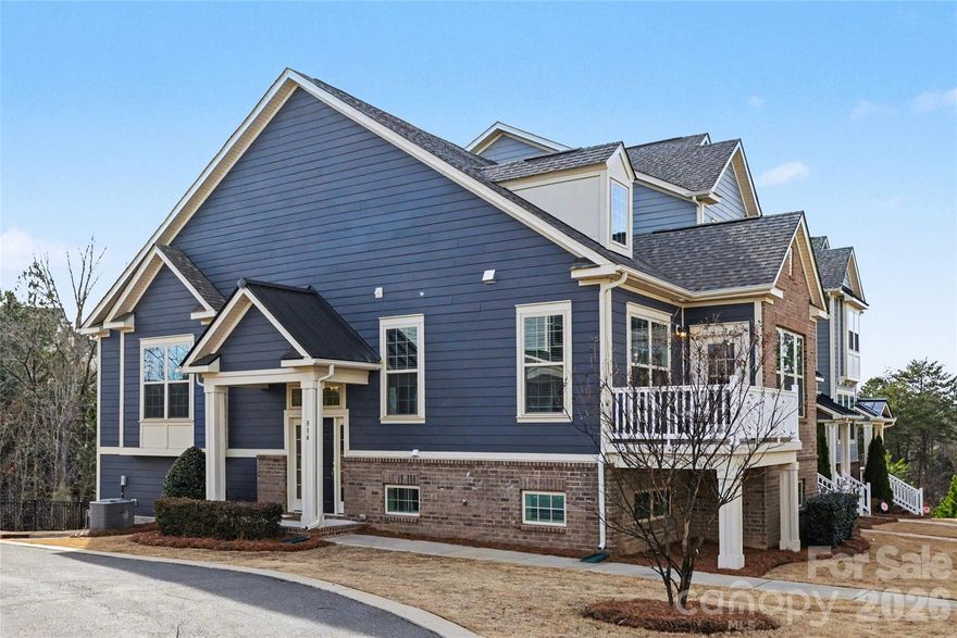 Welcome to this move-in ready corner unit townhome in the desirable neighborhood of Cameron Creek! This beautifully designed and freshly painted home features two spacious bedrooms, three full baths, a bonus room, and a versatile flex space for comfortable living. Inside, you'll find an inviting open-concept layout on the main level, highlighted by a large kitchen with upgraded granite countertops, a stylish subway tile backsplash, modern stainless steel appliances, a pantry, and an oversized island - ideal for meal prep and casual dining. The light-filled living room and dining area create a perfect setting for entertaining, with access to the front deck for outdoor enjoyment. Relax in the main level primary suite, which features a spa-like bathroom and 2 walk-in closets! The basement includes a large recreation room for relaxation, while the flex space and full bath can serve as a home office, play room or guest suite. You'll also enjoy a spacious laundry room and abundant storage options, including an attached two-car garage with epoxy flooring. Close to shopping, dining, I-77 and award-winning schools…don’t miss out on your chance to join this amenity-rich community!