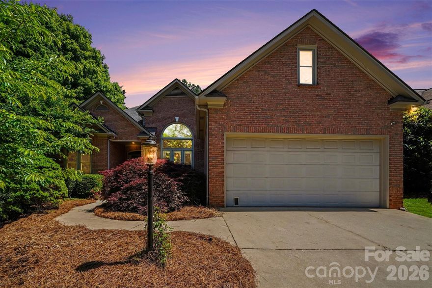 This full brick 3 BD/2 BA ranch with a split bedroom floorplan is move-in ready and thoughtfully updated throughout. The kitchen was renovated with new cabinetry, granite countertops, tile backsplash, gas stove with hood vent, stainless steel appliances, and the refrigerator & microwave will remain, opening to a bright breakfast area overlooking the screened porch. Fresh paint runs throughout the home, with new flooring in the bedrooms and a spacious primary suite that includes a private office or library nook. The primary bath features updated lighting, mirrors, cabinet hardware, and a hidden pull-out built-in, along with a tub, walk-in shower, and dual vanities.

Step outside to a truly special backyard—fully enclosed with a 6 ft privacy fence and designed like a private garden retreat that is professionally landscaped w/ blueberry bushes, butterfly bushes & year-round blooming plants. Enjoy both a large screened porch and separate paver patio, perfect for relaxing or entertaining. Additional highlights include new windows in 2025, HVAC (2018) with routine service, a Premier One UVC air purification system (2025), dehumidified crawl space with updated pump (2024), oversized 2 car garage with workspace, and a large floored attic. The washer & dryer will also remain. Low HOA at just $85/year and convenient to downtown Rock Hill, airport, shopping & restaurants!