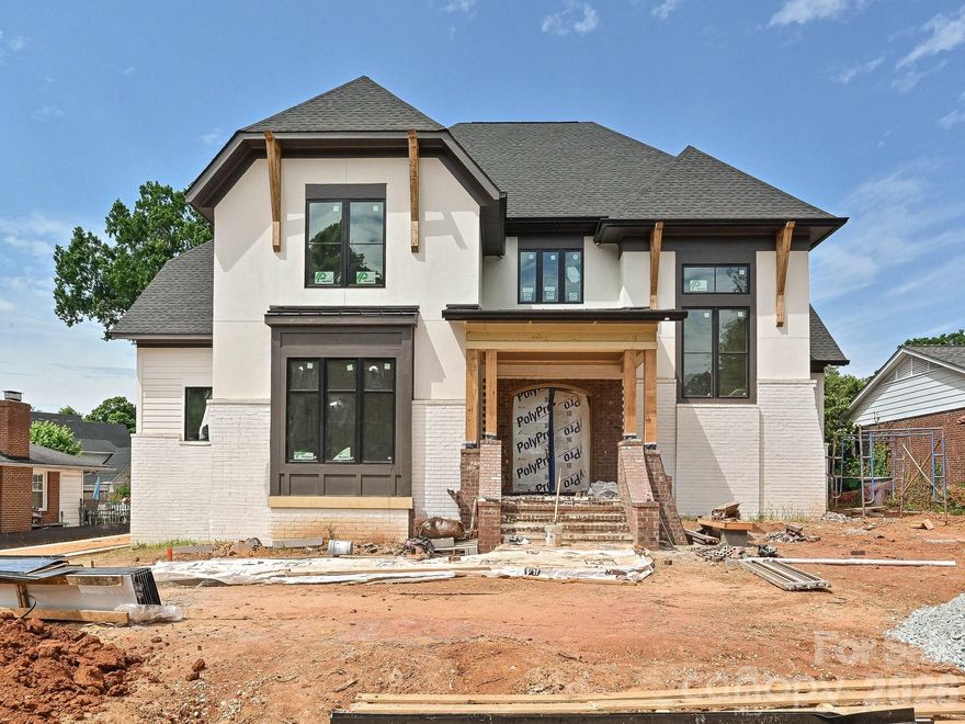 Nestled in the highly sought-after Ashbrook neighborhood, this exceptional new construction home offers the perfect blend of luxury, comfort, and location. Featuring 4 bedrooms, 4 full bathrooms and two half baths , this new build by RAM construction showcases elevated design and high-end finishes throughout.

The thoughtfully designed floor plan includes spacious living areas, designer lighting, wide-plank hardwoods, and a stunning chef’s kitchen with premium appliances, custom cabinetry, and an oversized island ideal for entertaining. The luxurious primary suite offers a spa-inspired bath and expansive walk-in closet.

Step outside to your private backyard retreat complete with a covered porch and outdoor fireplace overlooking the fenced yard, resort-style in-ground pool, and spa — perfect for year-round enjoyment.

A detached garage with a beautifully finished studio above provides endless flexibility for a guest suite, home office, gym, or creative space.

Located just minutes from Park Road Shopping Center, Uptown Charlotte, South End, and SouthPark, this home combines convenience with one of Charlotte’s most desirable neighborhood settings.

A rare opportunity to own a stunning custom home in the heart of Ashbrook.