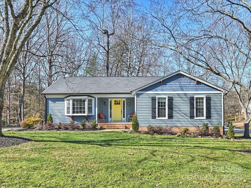 This charming 3 bedroom 2 bathroom ranch home is located on a beautiful corner lot in the popular Wood Hollow neighborhood. The home offers a spacious floor plan with beautiful LVP flooring, shiplap, and picture frame wainscoting. The primary bedroom is spacious and separate from the other bedrooms which includes a bath and walk in closet with vanity. The kitchen has lots of cabinet space and is adjacent to a dining area and office. Spacious Screened Back Porch off the dining area is the perfect spot to overlook the sprawling backyard!