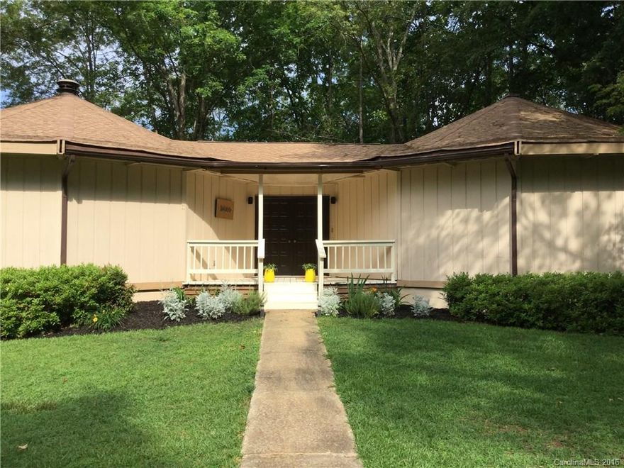 The most FUN ranch home in TC!  If architectural detail like 180 panoramic picture windows, vaulted ceilings, & a 360 round stone hearth fireplace are for you, look no further.  Lake & park views, quiet corner lot.  Think outside the box!  Think double round layout.  One open floor plan & one for beds/baths.  Partially updated incl. new deck, 1 HVAC unit, dishwasher & bath upgrades.  Walk-out basement.  Level drive to park several cars & room to add a garage.  New roof & windows in 2011.