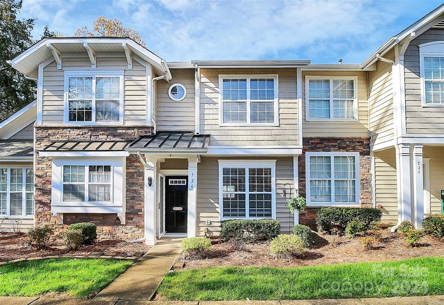 Move-in ready modern townhome 2 BR, 2 1/2 BTH, open floor plan flows effortlessly. Relax by custom gas fireplace. Serene & peaceful private fenced backyard, perfect for enjoying morning coffee or evening gatherings. Positioned as the 2nd from the end townhome, with added privacy & tranquility. Inside plank floors grace main level, abundant natural light. Kitchen features an island & comes fully equipped with a refrigerator & washer/dryer, making moving easy. 2 assigned parking spots, you can drive right up in front. Recent upgrades new gorgeous walk-in shower & pretty vanity in master BTH, new vanity 2nd full bath & completely redone back patio. New light fixtures dining room, kitchen, & master BR, entire interior freshly painted. New carpet on stairs. Amenities includes community pool, playground, pond, & sidewalks. Don't miss out on the opportunity to call this meticulously maintained townhome yours. Schedule your showing today & start envisioning your life in Ridge Pointe!