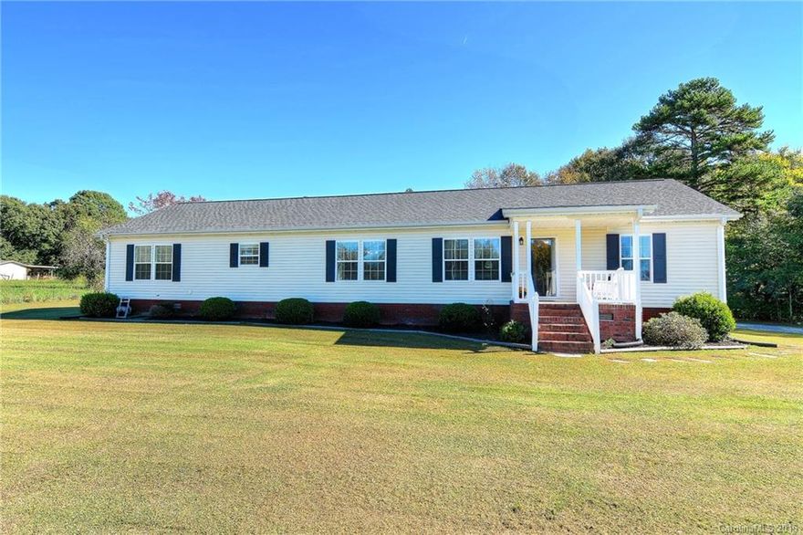 Immaculate home with open floor plan, custom built-ins and unique accents, on an acre of land.  Four Bedrooms and two full baths.  Split bedroom floor plan.  Kit w/blk appliances  and large island.  Office/study.  Separate laundry.  Great room with FP.   This property has that country feeling and privacy (no HOA) and yet shopping, doctors, restaurants, etc. are 15 minutes away in Ballantyne. USDA Approved.