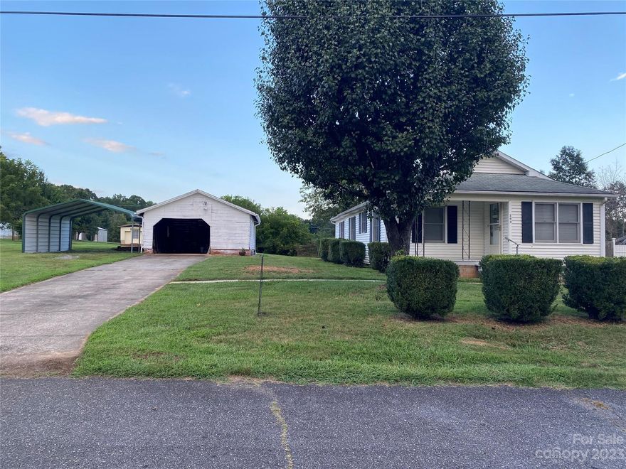 Very Well Maintained Home in Move-In Condition, This home features many wonderful updates. Floors have been updated with vinyl planks, Kitchen counters and backsplash have been redone, Bathroom has been updated, Extra room could possibly be used as 3rd bedroom but does not have a closet, Nice size laundry room with new flooring. Full basement for storage. Outside features a large level yard, covered front porch, back deck and a large patio, single garage/storage, double metal carport.