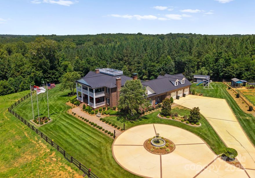 One of a kind opportunity to own a private, gated compound on nearly 30 acres. The main residence built just 10 years ago was constructed to reflect Antebellum elegance and offers over 5000 square feet, features reclaimed tobacco barn floors, antique doors, antique fireplaces, and period style details throughout. The grounds feature a barn, pastures, and a pond. The barn has 8 stalls including an extra large birthing stall, office, tack room and half bath. A secondary modern farmhouse provides nearly 3000 square feet, 4 bedrooms and a bonus room.