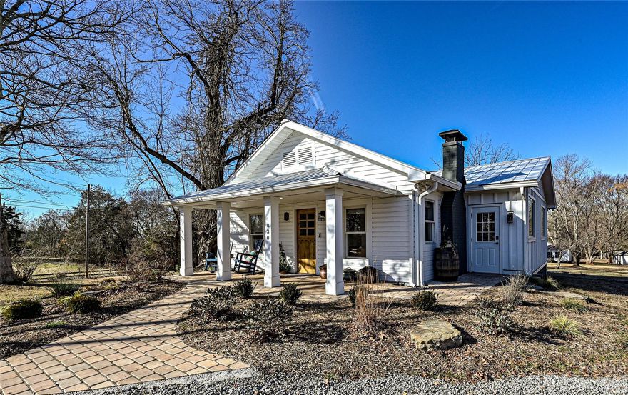 Discover the charm of this magical Davidson farmhouse, built in 1912 and situated on .88-acre corner lot overlooking Abersham Park. Recently renovated, this high efficiency home combines modern amenities w/classic farmhouse charm- including Dutch front door, vintage-style gas stove, farmhouse sink, secret walk-in closet behind a bookcase & the original chimney, surrounded by shiplap, has been updated w/gas fireplace. Intentionally designed, single story floorplan offers open kitchen/great room, versatile flex room & 3BR, 2BA- w/option to accommodate 2 private ensuite baths.  Primary suite has walk-in closet/spa-like wetroom w/clawfoot tub. Sustainable features- well water, tankless water heater, efficient appliances, low maintenance landscaping & automated irrigation while easily accessible without stairs at entry & zero-entry showers.  Back deck overlooks walnut, peach, and pecan trees.  Minutes from Downtown Davidson- Unique investment opportunity for short or long-term rentals!