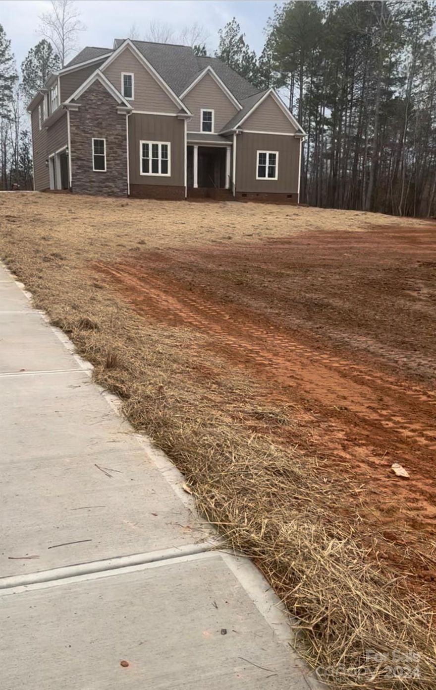 Welcome to your dream home in 2024! This stunning custom-built home boasts luxury and comfort on a spacious 1.18-acre lot. With 5 bedrooms, 4 bathrooms, and custom features throughout, it's the perfect blend of elegance and functionality. Custom Walk-in Closets: Ample storage space
Large Pantry: Keep your kitchen organized and stocked.
Chef's Kitchen: Equipped with wall-to-wall ceiling-height cabinets, double wall oven, and drawer microwave for convenient cooking. High-quality finishes add a touch of elegance.
Primary Bedroom: Enjoy the coffered ceilings and pendant lights for nightstands, creating a serene retreat.
Custom Features: Thoughtful details and craftsmanship throughout the home.
Covered Porch: Perfect for relaxing and enjoying the outdoors.
Screened-in Patio: Ideal for entertaining guests or enjoying a quiet evening.
Ceiling Fans: Installed in all bedrooms for added comfort.
This home is a rare find, offering unparalleled luxury and comfort in a serene setting.