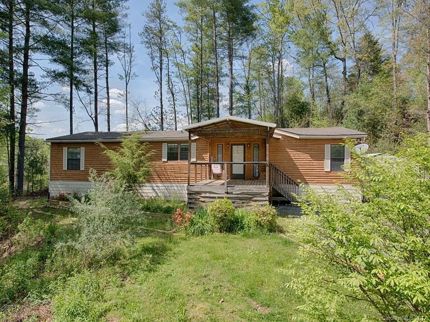 Just down the street from Pisgah National Forest.  Be close to fishing, hiking, biking, restaurants, and shopping from this convenient location.  Home sits on 3+ acres with RV spot, mountain view, and easy access.