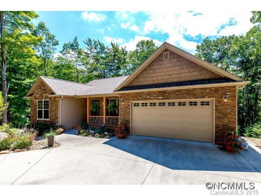 Only occupied since 2012.Shows like a model.Professionally landscaped corner lot w/ boulder accents.Hrdwd floors thruout, 9'ceilings, 2-zone H/A,2 decks. Greatrm has vaulted ceiling, stone FP & skylights.Upscale kitchen incl. custom cabinetry, granite counters, SS appl. 11x10 brkfst room. Lighted tray ceiling in DinRm. Master features tray ceiling, H/H WIC, jetted tub. Designer decor thruout. Impressive LL w/cork flrs,immense FamRm w/FP,off/BR+BA