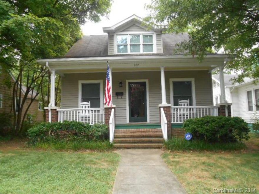 Historic charm but under 20 years old! No need for updating or renovating! Built in 1997, has a rocking chair front porch, Kitchen with breakfast bar, recessed lighting and glass door display cabinets. Specialty wood floors, laundry closet on main floor. Owner's suite upstairs has it's own private ba. and w/i closet. French doors open to the deck off back which is attached to lower patio area, great for grilling out and entertaining in the fenced back yard. Alley behind home gives garage access.