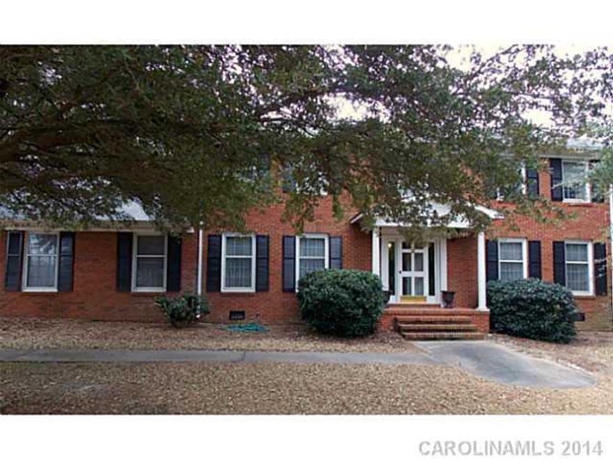 Beautiful traditional all brick 4 br, 2.5 ba home on spectacular 2.5 acre landscaped lot.  Scenic pond lines back property line.  Pond is not part of property.  Gorgeous mature azaleas and pears in spring.  Graceful entry and formal living and dining.  Inviting den.  Master and second bedroom very large.  Two smaller bedrooms.  Large sunny kitchen with breakfast.  Quiet Pageland street with little traffic.  Very motivated seller.  Bring offer!