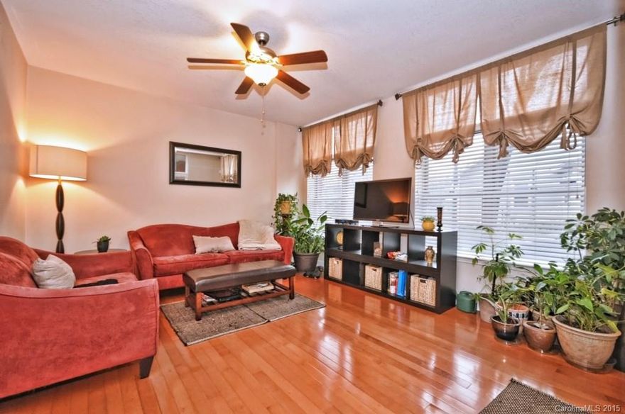 2 story unit w master bedroom&balcony on 2nd floor & den/office on the 2nd floor. Downstairs is open with kitchen, DR, living room, 1/2 bath (new tile) & coat hanging area. Granite counter tops, hardwoods, well lit living room. Walk to all East Blvd shopping & dining has to offer. Park on Fillmore & enter from street OR enter from secured building. Covered secured parking, storage room in parking area, Fitness center & rec room (6th Floor) which leads to patio/balcony overlooking East Blvd.