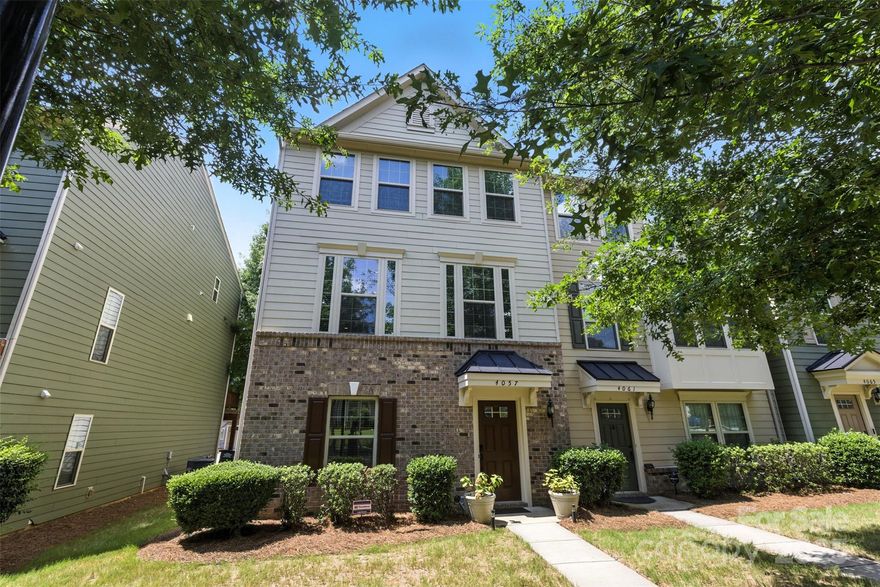 Impeccably maintained and bathed in natural light, this 3-story, 2390sq ft, END-unit townhome in the City Park neighborhood, is located just minutes from I-77, Airport, Renaissance Park, the Charlotte Regional Farmers Market and Uptown Charlotte. The main level features a flex/office/gym space with French doors, a convenient half bath, and ample storage. On the second level, enjoy a spacious open-concept layout with wood floors, built-in Bose surround sound in the living area, and a well-appointed kitchen featuring SS appliances, a gas range, coffee/bar area, oversized island, breakfast bar, and large deck-perfect for entertaining! On the third floor, you'll find a spacious primary suite with a garden tub, separate tiled shower, and walk-in closet, 2 secondary bedrooms, full bathroom and laundry room. Brand new carpet and fresh paint throughout create a move-in-ready feel. 2-car garage with epoxy floors. Includes on-demand hot water. Turnkey, low-maintenance living in a prime location!
