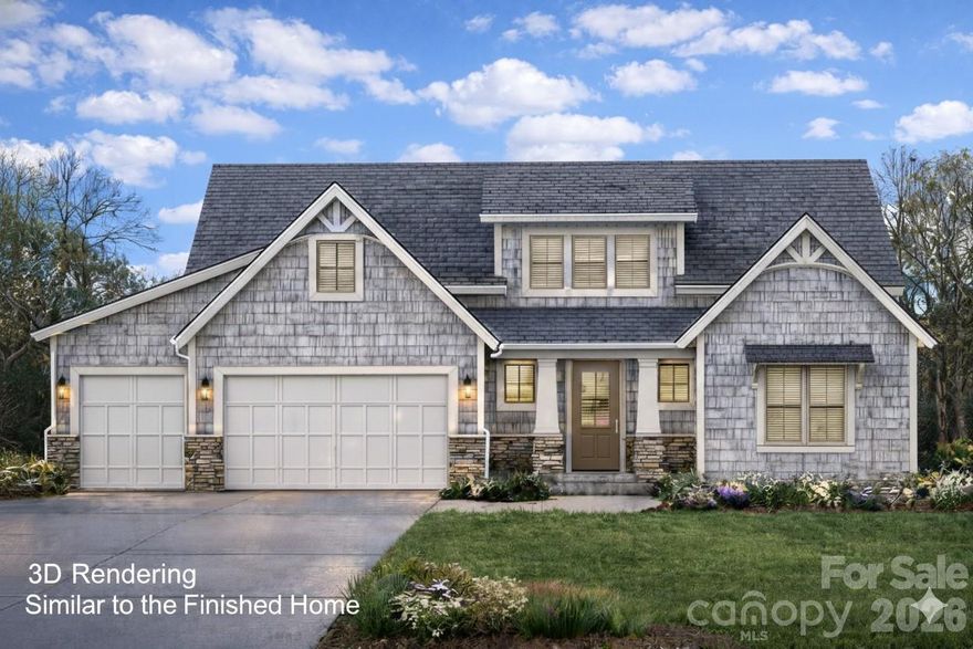 As you arrive, you’re immediately greeted by striking architectural design that blends timeless craftsmanship with inviting curb appeal, perfectly situated in a quiet country setting in desirable North Lancaster. The thoughtfully detailed façade features layered rooflines, charming gables, and a beautiful mix of textures that create depth and character, while the welcoming front entry sets an elegant yet relaxed tone. Enjoy the peace and privacy of country living in a perfect yet convenient location.

Step inside and immediately feel at home as a wide-open foyer welcomes you into a bright, expansive layout designed for modern living. The open-concept floor plan creates a seamless flow between living spaces, making the home feel both spacious and inviting.

At the heart of the home, the kitchen exudes timeless country farmhouse charm, thoughtfully designed for both beauty and function. A generous oversized island anchors the space, offering ample prep room, inviting seating, and a natural gathering spot for morning coffee or lively evenings with family and friends. The classic wall-oven design provides a clean, built-in look while enhancing everyday convenience, and a spacious walk-in pantry offers abundant storage for everything from farm-fresh finds to entertaining essentials. Boasting a beautiful backsplash and quartz countertops the kitchen is warm, welcoming, and perfectly suited for gathering, this kitchen is truly the soul of the home.

The living room is a true showstopper, highlighted by a gorgeous, stacked stone fireplace that adds rich texture, warmth, and timeless character to the space. A stunning window wall spans the back of the home, flooding the room with natural light and framing beautiful views of the expansive backyard. This dramatic backdrop enhances the home’s open, airy feel while creating a seamless connection between indoor living and the outdoor landscape—perfect for both everyday enjoyment and entertainment.

The primary bedroom suite offers the perfect blend of comfort and charm, thoughtfully sized to feel open yet cozy. A faux beam ceiling adds timeless character and architectural warmth, creating a relaxing retreat. The ensuite bath feels spa-inspired, featuring a generous walk-in shower, a beautiful freestanding soaking tub, and a spacious walk-in closet—designed for both everyday convenience and peaceful unwinding.

The covered back porch offers a relaxing place to unwind while overlooking the expansive backyard, providing the perfect setting for peaceful mornings and laid-back evenings.