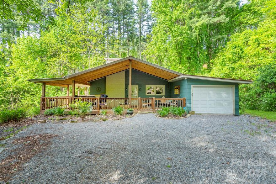 Over the creek and through the woods to this cute renovated cottage tucked into Laurel Ridge Country Club.  Remodeled in 2016, this 3 bed/2 bath with attached garage has everything all tucked into one-level living.  Wrap around covered porch is perfect to enjoy all the outdoor living you wish for while maintaining privacy.  

Come take a tour today! Owner related to Listing Agent