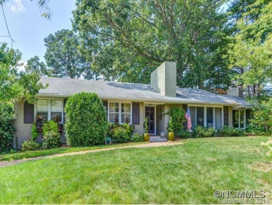 POPULAR NORTH ASHEVILLE! Enjoy this updated home w/mostly main level living, screen porch, landscaped & newly fenced backyard. Kitchen recently updated(granite/SS), 3rd full bath recently added. New master suite easily 2nd family room for smaller family. 3 wood-burning fireplaces! Lower level bonus/play space with 1/2 BA, lots of storage, and double garage. FANTASTIC location--walkable to Asheville Country Club & Beaver Lake! Less than 10 min to downtown Asheville.