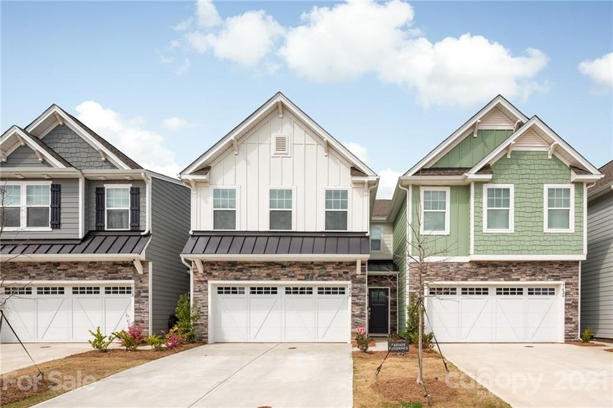 Like-New beautiful townhouse built in 2020! Move-in Ready! No need to wait for one to be built! Centrally located near all major roadways and attractions. Neighborhood amenities include junior Olympic sized pool, splash pad, walking trails, and fitness center! This lovely home boasts beautiful finishes, new flooring and new paint completed last week! Custom fireplace with a floor to ceiling built in bookshelf surrounding the fireplace! Wait until you see this kitchen! This home has been cared well and was built just a year ago in 2020! MOVE IN READY!