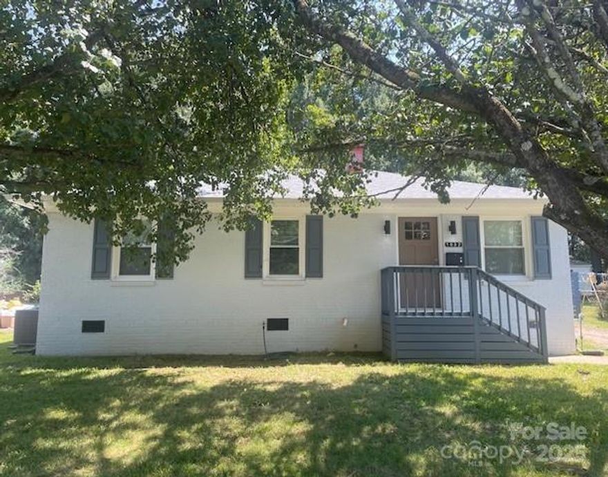 NEW ROOF, NEW HVAC AND NEW HOT WATER HEATER! Beautifully renovated full-brick single family home featuring LVP flooring throughout and a fully remodeled kitchen with new cabinets, granite countertops, and stainless steel appliances (less than 2 yrs old). Freshly painted inside and out with all new interior doors and ceiling fans. Newer gutters. Enjoy the privacy of a fenced-in backyard. This move-in ready home is perfect for first-time buyers, someone looking to downsize, or an investor seeking a solid opportunity as it has been consistently rented and is move in ready! Buyers will enjoy the location that is close to shopping, restaurants, and I-77. Home is being sold "as-is". Don't miss this one!