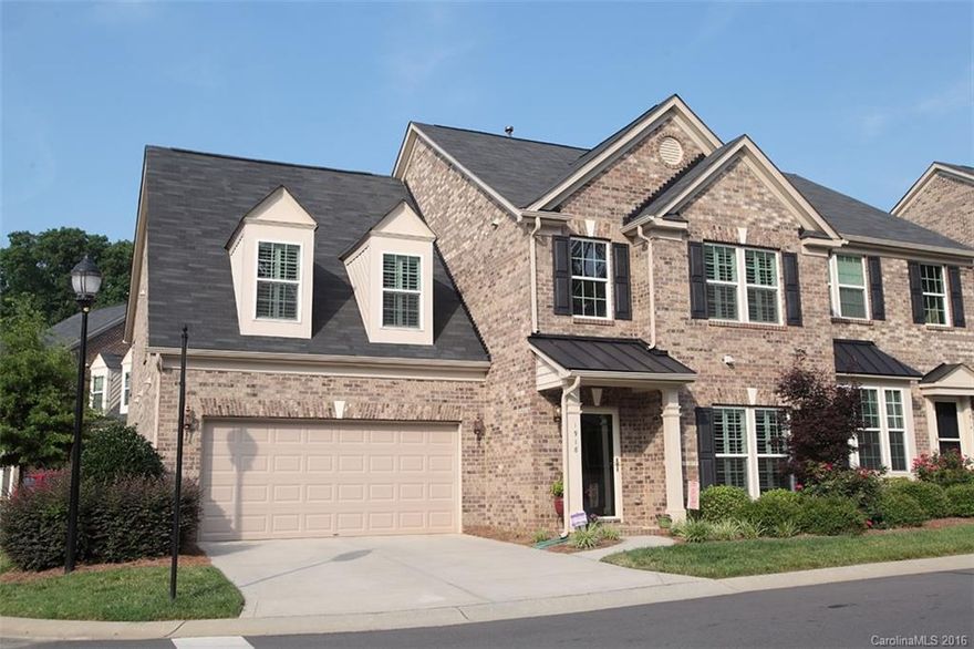 Ryan Home built (Elmhurst model) townhouse (end/corner unit) will leave you swooning. It's open floor plan with vaulted ceilings makes for perfect entertaining. Newly installed multi-plank oak floors throughout, master retreat on main level including dual granite countertops. Plantation shutters, neutral paint, fresh carpet, fenced yard, butlers pantry...plus so much more! Less than 3 miles to South Park shopping, dining and entertainment and less than 8 miles to Center City Charlotte!