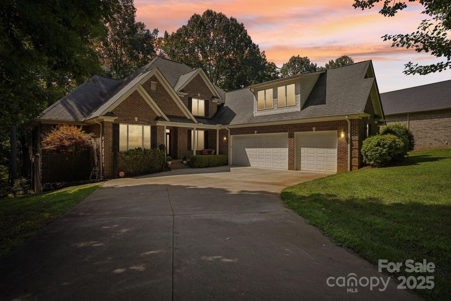 Gorgeous waterfront home in a private & wooded setting! It's rare to find a large & private 0.868-acre waterfront lot on Lake Norman. Amazing quality finishes & craftsmanship throughout! Immaculately maintained home w/ recent updates: 1st-floor furnace and AC (2021), well pump (2022), 2nd-floor furnace and AC (2023), propane tank (2023), dishwasher & water softener (2023). Beautiful hardwood floors & a bright open floor plan. Gourmet kitchen w/ double oven, gas cooktop, granite countertops, tile backsplash, kitchen island & 42" cabinets. Super spacious primary suite on the main level & an amazing sunroom w/ beautiful lake views. Incredible Xtra-large 3-car garage with 18 ft. door. Privacy abounds w/ a cul-de-sac lot & a community common area across the street. 2 gas fireplaces & 1 high-efficiency wood-burning fireplace w/ free stacked firewood in the backyard. Low HOA! Tons of storage space! Endless possibilities w/ over 2,000 sq ft of unfinished space in the basement & the 2nd floor!