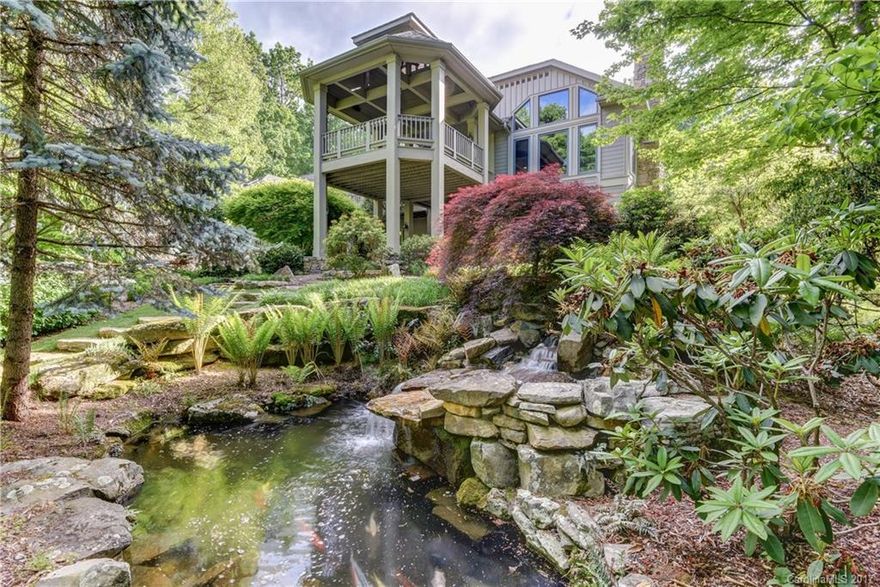 A hallmark of design & quality w/ ultimate privacy. Main level living featuring oak HWD floors w/ black walnut inlays, beamed & coffered ceilings, library, DR, great rm w/ stone FP, gourmet kit w/ island & butler's pantry, luxurious master suite, expansive laundry room & mud rm. The LL features a family rm, billiard area, full bar, card rm& 2 guest suites. Outdoor living options include the gazebo-style covered deck, open deck, stone patios, cascading waterfall w/ Koi pond & lush landscaping.