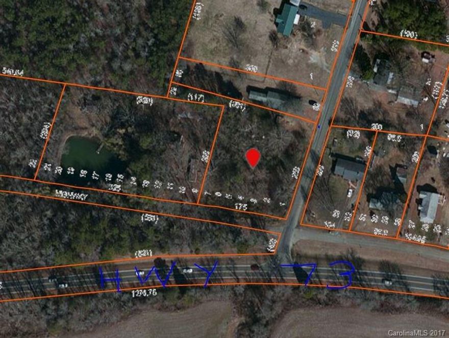 Small tract of land located just off Hwy 73 in Mount Pleasant.  Land actually accessed from Moose Road.  Mostly wooded, but could make great location for new home.