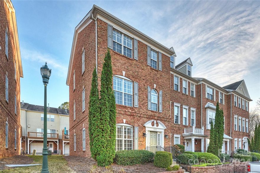 Highly desired upgraded end unit within walking distance of Ballantyne Village - offering a host of locally loved shops and restaurants!! This one is all about lifestyle!
