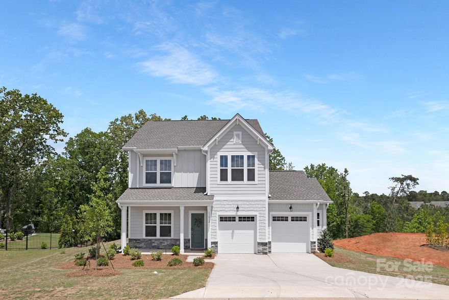 This stunning 3-bedroom, 2.5-bath Hudson home with a 2-car garage is located in The Links at Edgewater, Charlotte's 2024 MAME Community of the Year! The well-appointed kitchen features upgraded quartz countertops, tile backsplash, a gas range, modern lighting, and a spacious pantry. The main level includes a large great room, private study, separate dining area, and a rear screened porch with patio—ideal for entertaining. Upstairs, enjoy the expansive primary suite with a sitting area, walk-in closet, and ensuite. Two generously sized secondary bedrooms, a full bath, laundry room, and game room complete the second floor. Edgewater boasts a top-ranked public golf course, a recreational boating and fishing lake, and many upcoming attractions, including fine dining, enhanced golf and racquet facilities, retail shopping, and more!