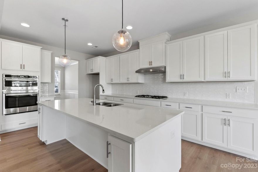 MLS # 3940622 REPRESENTATIVE PHOTOS ADDED. Summer Completion! Inside the Kenilworth is a welcoming foyer opening into the formal dining room with a sizable study and powder room. Beyond the stairs, a large family room flows seamlessly into the breakfast nook and gourmet kitchen. The kitchen includes ample cabinets plus a spacious center island. Around the corner is the entrance to the downstairs guest suite and the covered outdoor living. Up the stairs, this home offers three secondary bedrooms plus the immaculate owner’s retreat. Structural options added to 3220 Kintore Lane include: 3-car garage, study, covered outdoor living, windows at stairs, fireplace, and gourmet kitchen.