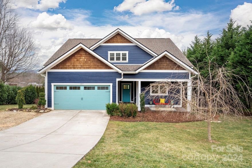 Welcome to your new mountain home in Fairview, a four-bedroom gem exuding both charm and artful design. Upon entry, you're greeted by a vaulted ceiling and open floor plan, including a light-filled living room, dining room, and chef's kitchen. The primary suite on the main level offers a private retreat, with carefully curated finishes ample space for relaxation, and easy access to both upper and lower back decks. Custom closets add a luxurious touch, making every nook both functional and beautifully organized. Upstairs, discover generously sized bedrooms, providing comfort and versatility. The expansive decks offer breathtaking mountain views and overlook the sunny landscaped lot, creating an idyllic setting for entertaining or simply enjoying the tranquility. This home is upgraded tastefully, blending comfort with refined style. Minutes to hiking, biking, and entertaining. 20 minutes to downtown Asheville, and Asheville airport. Live in style and comfort, surrounded by nature.