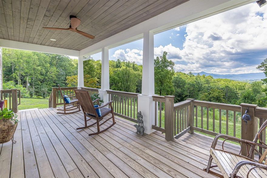 Welcome to Mountain Estate, a 34-acre private retreat in Candler. Nestled in a tranquil hollow, the property features stunning views of Mount Pisgah and is located just 12 miles from downtown Asheville. The Owner’s Lodge (73 Forrest) is a 3 BD/2.5 BA intentionally designed home witnessed in the floating stairs, rotating wood stove, efficient kitchen and deep front porch with views. The detached garage houses the battery system and inverter for the solar array. Pulleys store kayaks above and loft storage keeps gear accessible. The Appalachian Cabin (89 Forrest) was built in the early 1900s and remodeled in 2017. The versatile Apartment & Workshop (75 Forrest) has untapped potential in 1500 sq ft of unfinished space. Enjoy 1.5 miles of walking, hiking, biking or ATV trails through the wooded terrain or entertain future development at one of the cleared sites. Garden enthusiasts delight in the herb and flower garden, green meadows, vineyard and large, stepped garden.