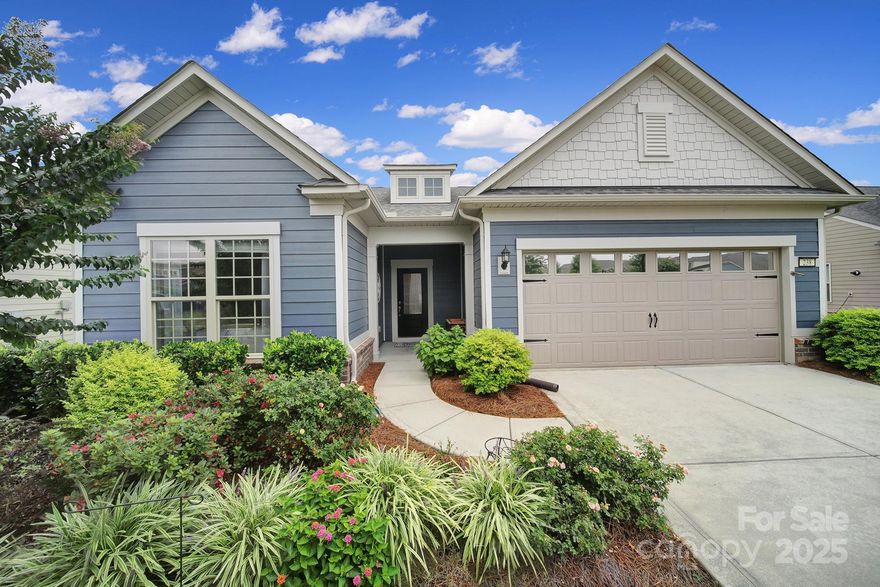 Have you been waiting for "the one" in Carolina Orchards? Here it is! This one is unique, offering a serene water view from the backyard, as well as extra green space between the neighbor to the right. This is one of a kind! This home has been meticulously maintained. It offers convenient living with split BR plan, office with French doors, gourmet kitchen, open floorplan with a flex space perfect for formal dining room, sitting room, or sunroom. This stunning home also offers a spacious living room and large primary suite. Additional highlights include a mudroom entry with built in drop zone and a 2-car garage. Enjoy the views from your private screened lanai, or from the extensive paver patio. Carolina Orchards offers landscaping, 2 community clubhouses, 4 tennis courts, 8 pickleball courts, indoor & outdoor pool, large-covered shelter, bocci ball, horseshoes, outdoor fireplace, and gym. Tons of activities and clubs to join. This isn't just a neighborhood, it's a lifestyle!