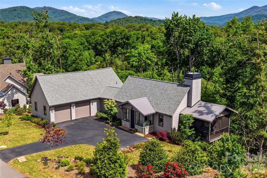 Set within the quiet, gated enclave of Riverbend Forest, 162 Riverbend Forest Drive embodies the understated elegance and natural beauty synonymous with refined Asheville living. Just moments from downtown, this residence offers river and mountain views with effortless access to the area’s celebrated dining, culture, and outdoor pursuits.

A light-filled, open-concept design unfolds with gracious living spaces tailored for both intimate moments and sophisticated entertaining. The kitchen serves as a true centerpiece—appointed with abundant custom cabinetry, sleek surfaces, and mountain views—seamlessly connecting to the living and dining areas for an elevated yet inviting experience.

The primary suite is a serene retreat, complemented by well-proportioned guest rooms and flexible spaces suited for work or leisure. Outdoor living areas invite quiet mornings and relaxed evenings, surrounded by the tranquility of the natural landscape.

An exceptional offering where privacy, design, and location converge—capturing the essence of timeless mountain luxury