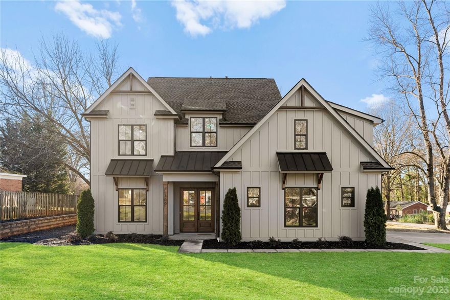 Discover an extraordinary residence presented by Lagniappe Homes! Spanning 3,580 SqFt, this luxurious abode boasts 4 Beds, 4.5 Baths, Office/ flex room, Rec Room, and Bonus Room that can be used as a fifth bedroom. Nestled on a corner lot surrounded by mature trees, a unique find in new construction, and just steps away from the dynamic dining scenes of Cornelius and Davidson. Lavished with upscale details, the main level features an en-suite office/guest room and a Primary Bedroom with a stunning en-suite, including a freestanding tub, water closet, custom tile shower with frameless glass, and walk-in closet with built-ins. The heart of the home, the kitchen, showcases a 36" gas range, custom range hood, refrigerator, beverage fridge, solid wood cabinets, quartz countertops, and under-cabinet lighting. Additional luxuries include a 12' multi-slide glass door, 10' ceilings, coffered and tray ceilings, solid core doors, and a tankless water heater. A perfect canvas for a future pool!