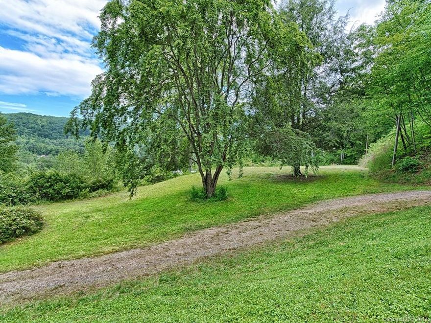Enjoy the privacy and mountain view on 3.46 acres.