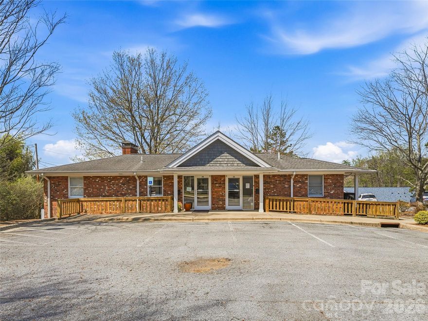 Positioned within the established Herman Avenue Office Park, this ±1,658 SF commercial investment opportunity offers a fully occupied, multi-tenant building ideal for investors or owner-users seeking stable income in a convenient South Asheville location. The building is freestanding and currently has two tenants in separate units. Future users can occupy one or both spaces. Each unit has its own reception area and entry door, is individually metered, and has updated interiors. Office Park is clean and well-maintained, and the HOA has strong financials and reserves. Zoned HB (Highway Business), the property supports a wide range of potential uses, including professional offices, medical or wellness services, boutique retail, personal services, or specialty business operations. The building benefits from ample parking within a shared lot and a professional business environment surrounded by complementary commercial users. Conveniently located adjacent to Hendersonville Road at a signalized intersection near Long Shoals Rd, approximately 2 miles from Interstate 40, and less than 4 miles from Interstate 26, the property provides excellent regional accessibility and strong connectivity to Asheville’s primary commercial corridors.